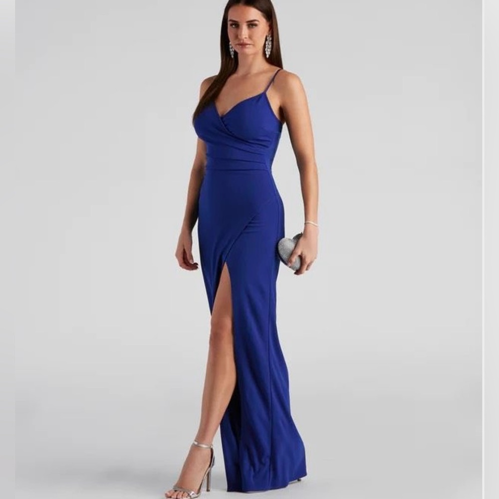 Navy blue formal dress with adjustable straps. Sexy high slit.